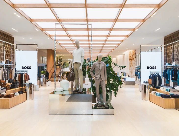 Interior of a BOSS store with male clothing (photo)